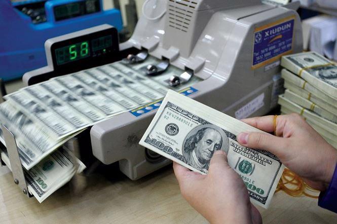 Chuyên gia dự báo tỷ giá hạ nhiệt do nhu cầu ngoại tệ giảm